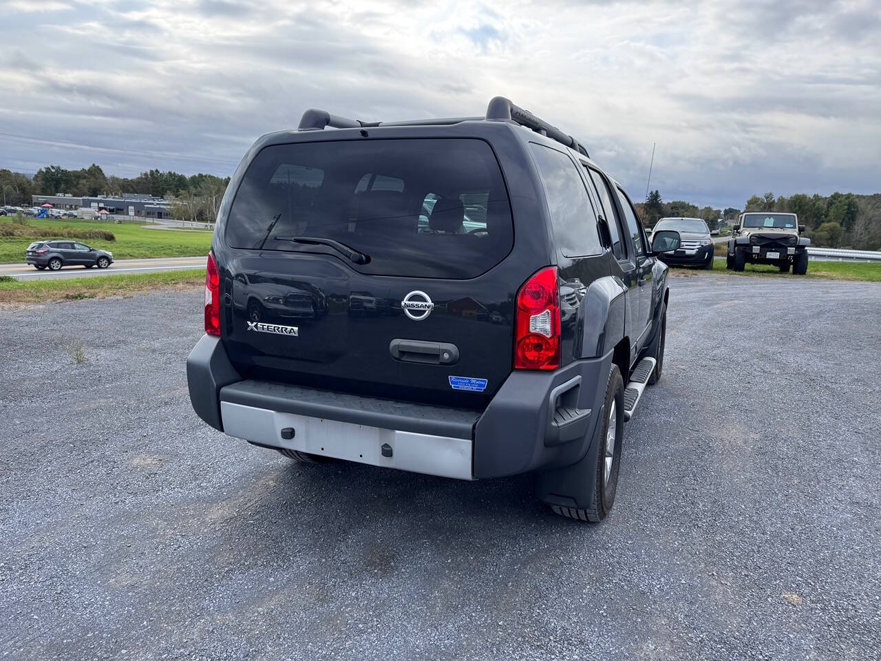 2012 Nissan Xterra for sale at Riverside Motors in Glenfield, NY