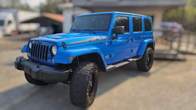 Used 2014 Jeep Wrangler Unlimited Polar Edition with VIN 1C4HJWEG3EL182016 for sale in Phenix City, AL
