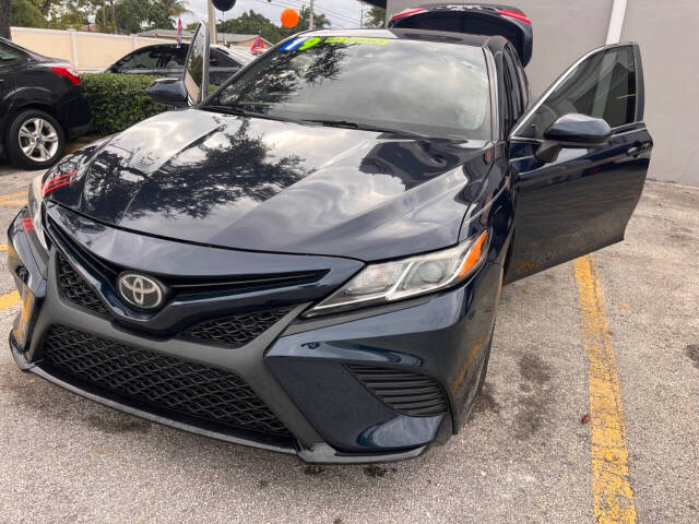 2019 Toyota Camry for sale at M & J UNITED AUTO SALES in LAUDERDALE LAKES, FL