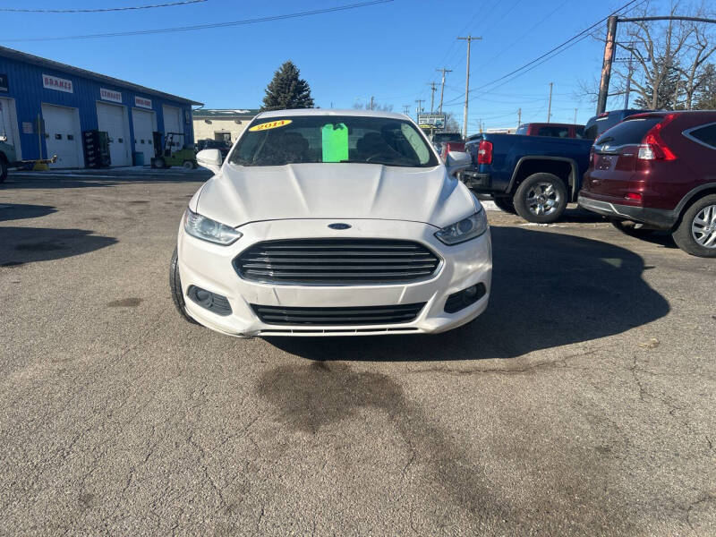 2014 Ford Fusion for sale at CHUCKS AUTO SERVICE LLC in Sturgis MI