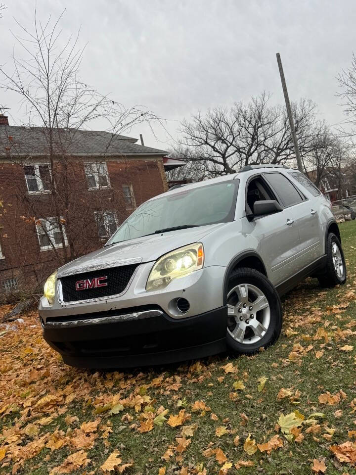 2011 GMC Acadia for sale at H & H AUTO GROUP in Detroit, MI