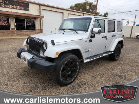 2011 Jeep Wrangler Unlimited for sale at Carlisle Motors in Lubbock TX