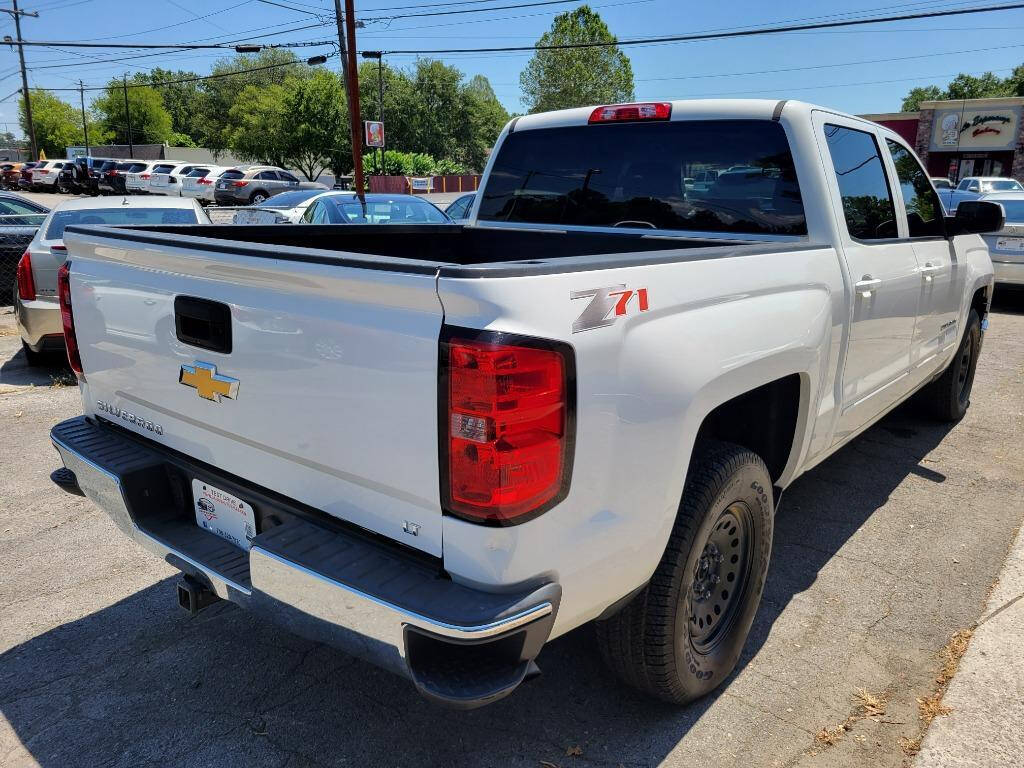 2015 Chevrolet Silverado 1500 for sale at DAGO'S AUTO SALES LLC in Dalton, GA