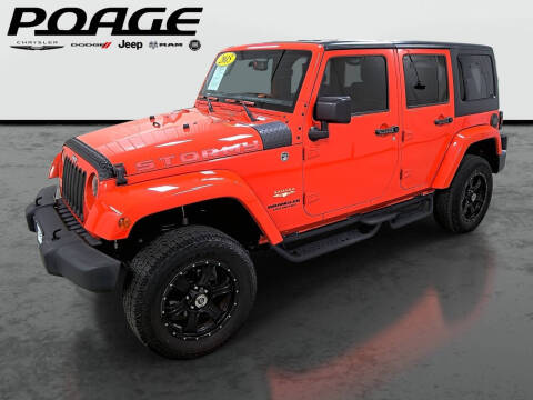 2015 Jeep Wrangler Unlimited for sale at Poage Chrysler Dodge Jeep Ram in Hannibal MO