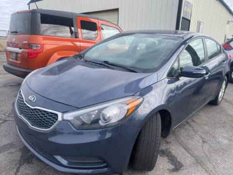 2014 Kia Forte for sale at BELOW BOOK AUTO SALES in Idaho Falls ID