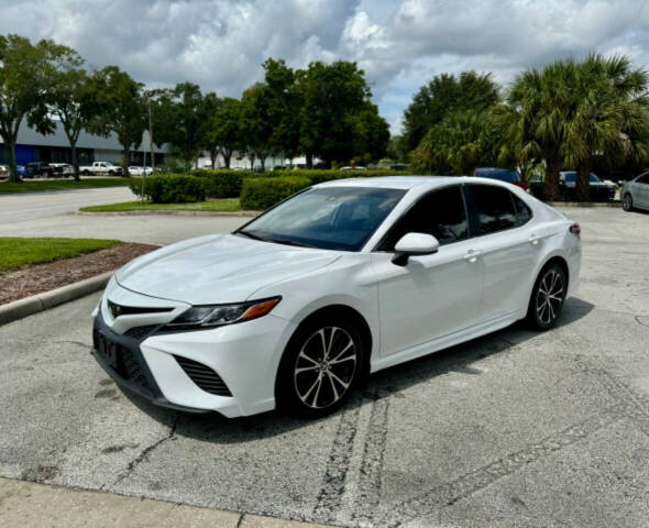 2020 Toyota Camry for sale at Zoom Auto Exchange LLC in Orlando, FL