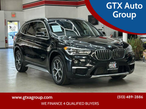2017 BMW X1 for sale at GTX Auto Group in West Chester OH