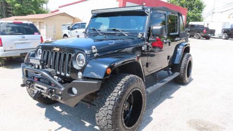 2014 Jeep Wrangler Unlimited for sale at RIVERSIDE CUSTOM AUTOMOTIVE in Mc Minnville TN