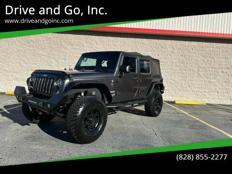 2014 Jeep Wrangler Unlimited for sale at Drive and Go, Inc. in Hickory NC