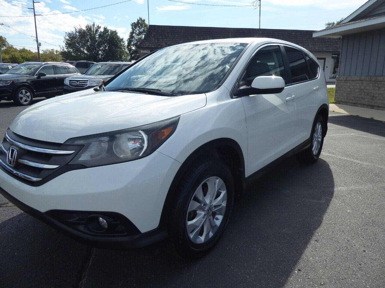 2012 Honda CR-V for sale at Lakeshore Autos in Holland, MI