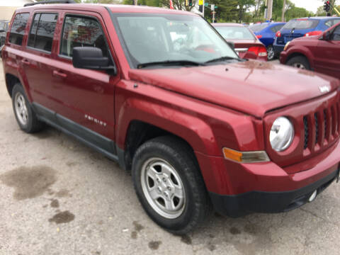 2011 Jeep Patriot for sale at HIDALGOS AUTO SALES in Omaha NE