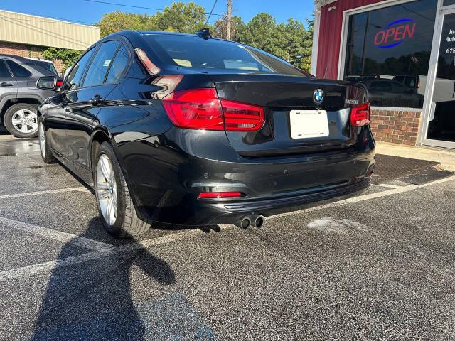 2016 BMW 3 Series for sale at Justin Hughes Auto Group LLC in Douglasville, GA