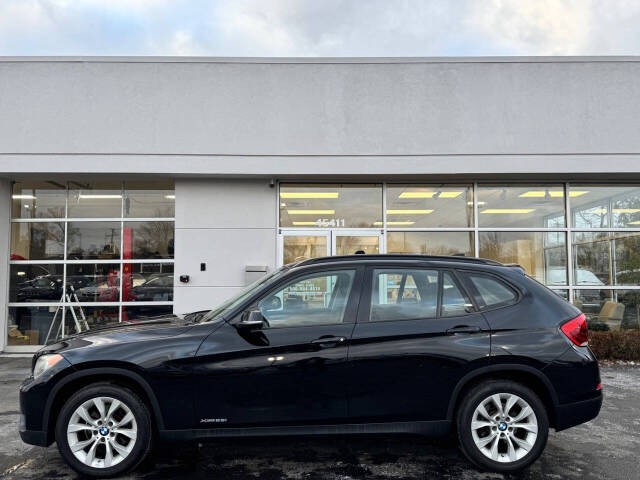 2013 BMW X1 for sale at Opus Motorcars in Utica, MI