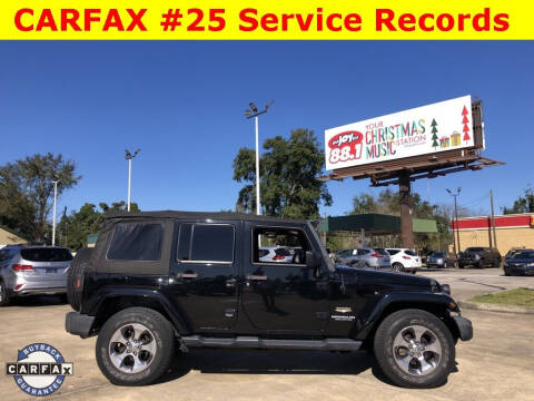 2014 Jeep Wrangler Unlimited for sale at CHRIS SPEARS' PRESTIGE AUTO SALES INC in Ocala FL