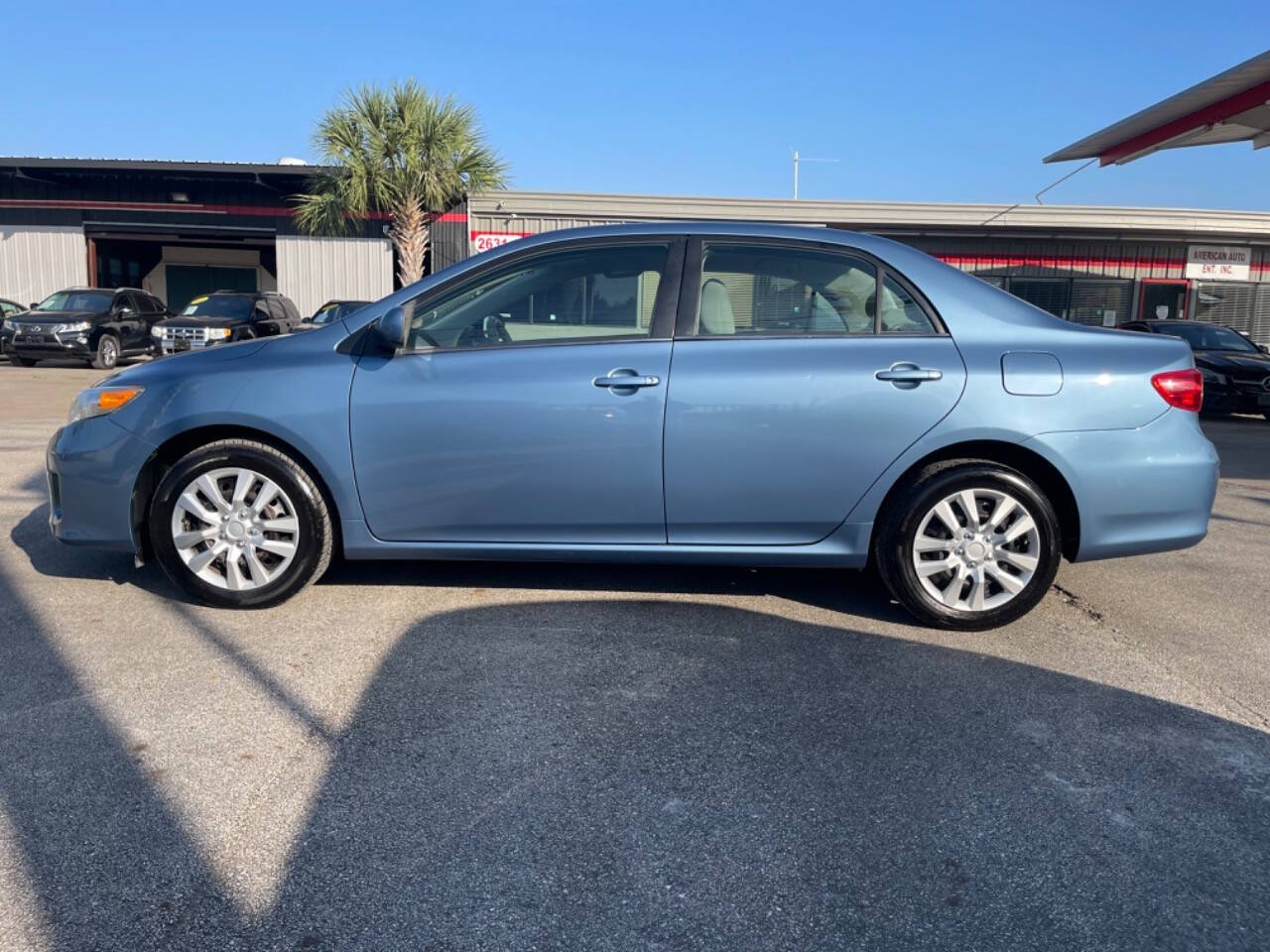 2013 Toyota Corolla for sale at SMART CHOICE AUTO in Pasadena, TX