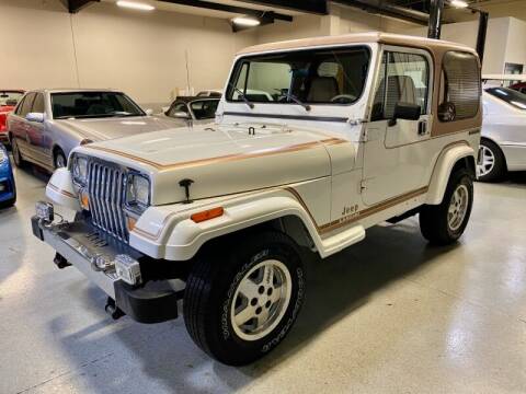 1987 Jeep Wrangler for sale at Motorgroup LLC in Scottsdale AZ