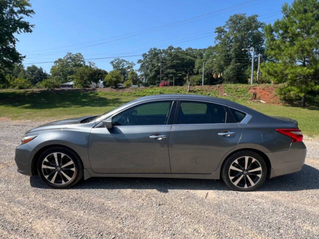 2016 Nissan Altima for sale at Guadalupe Auto Sales, LLC. in Jemison, AL