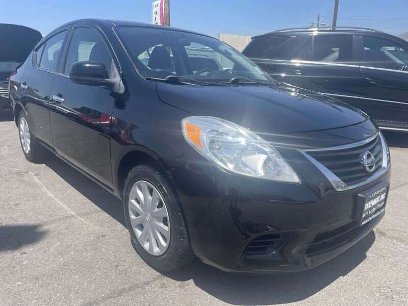 2014 Nissan Versa for sale at CARFLUENT, INC. in Sunland CA