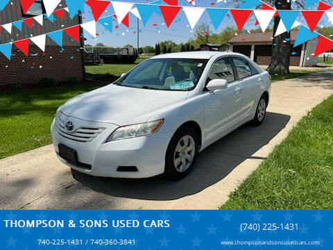 2009 Toyota Camry for sale at THOMPSON & SONS USED CARS in Marion OH