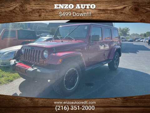 2012 Jeep Wrangler Unlimited for sale at ENZO AUTO in Parma OH