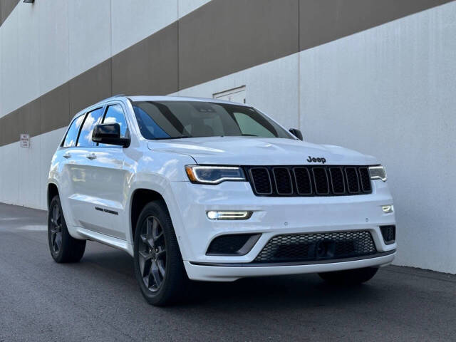 2020 Jeep Grand Cherokee for sale at Phoenix Motor Co in Romulus, MI