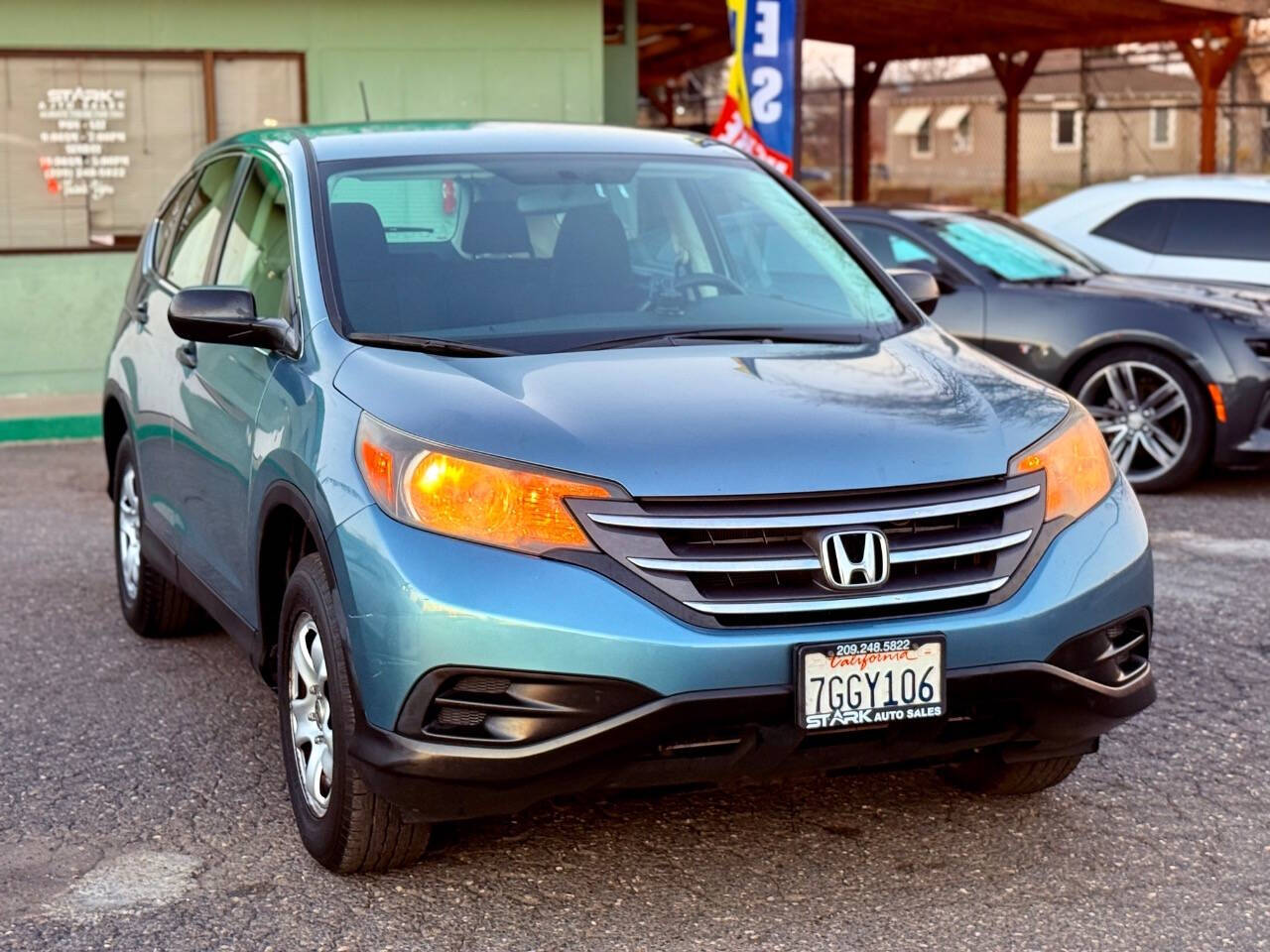 2014 Honda CR-V for sale at STARK AUTO SALES INC in Modesto, CA