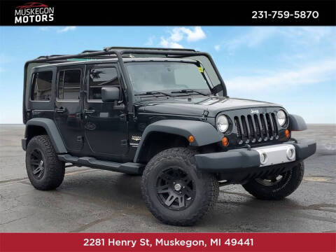 2012 Jeep Wrangler Unlimited for sale at Betten Pre-owned Twin Lake in Twin Lake MI