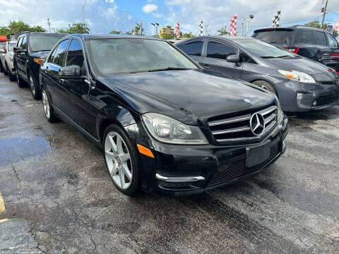 2014 Mercedes-Benz C-Class for sale at America Auto Wholesale Inc in Miami FL