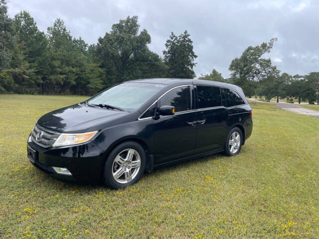 2011 Honda Odyssey for sale at Russell Brothers Auto Sales in Tyler, TX