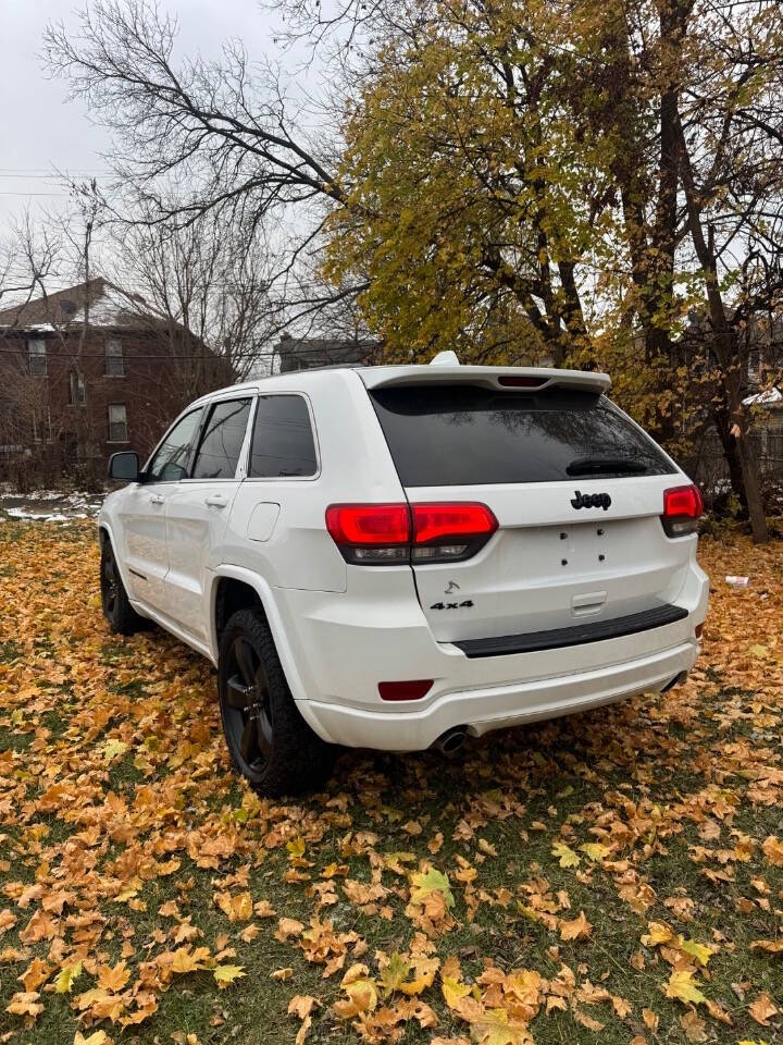 2014 Jeep Grand Cherokee for sale at H & H AUTO GROUP in Detroit, MI