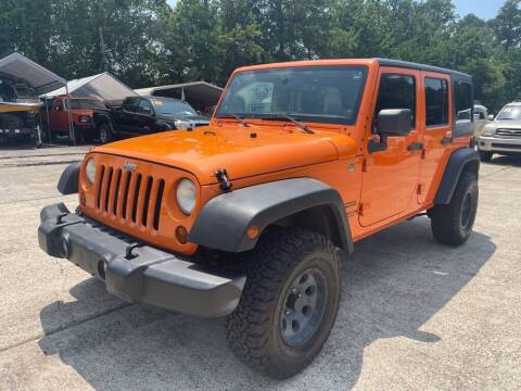 2012 Jeep Wrangler Unlimited for sale at AUTO WOODLANDS in Magnolia TX