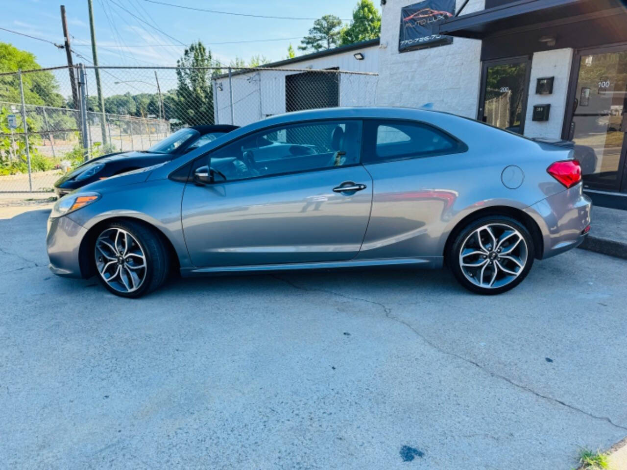 2016 Kia Forte Koup for sale at AUTO LUX INC in Marietta, GA