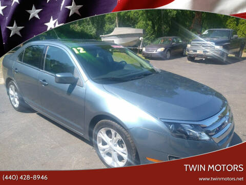 2012 Ford Fusion for sale at TWIN MOTORS in Madison OH