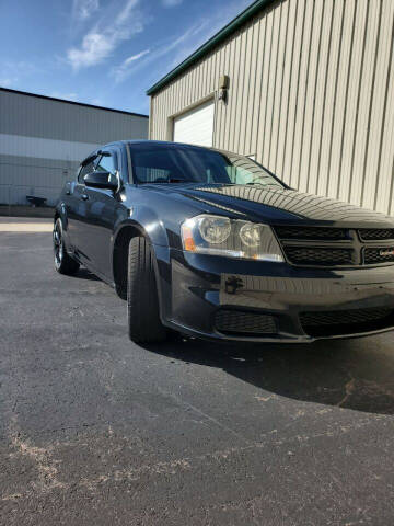 2013 Dodge Avenger for sale at Born Again Auto's in Sioux Falls SD