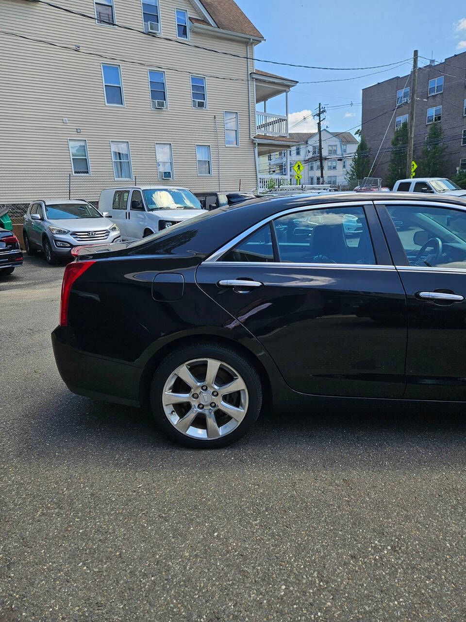 2016 Cadillac ATS for sale at RENOS AUTO SALES LLC in Waterbury, CT