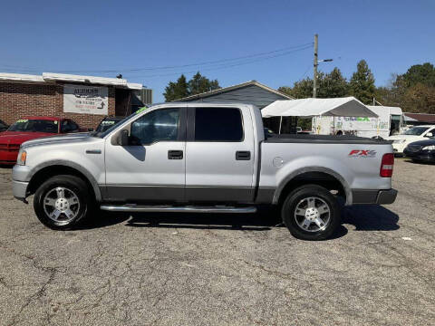 2005 Ford F-150 for sale at Autocom, LLC in Clayton NC