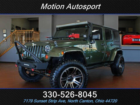 2009 Jeep Wrangler Unlimited for sale at Motion Auto Sport in North Canton OH