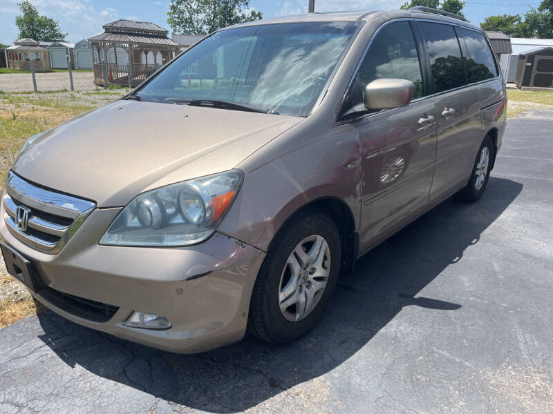 2006 Honda Odyssey for sale at HEDGES USED CARS in Carleton MI