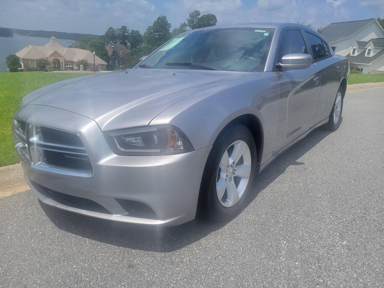 2014 Dodge Charger for sale at Connected Auto Group in Macon, GA