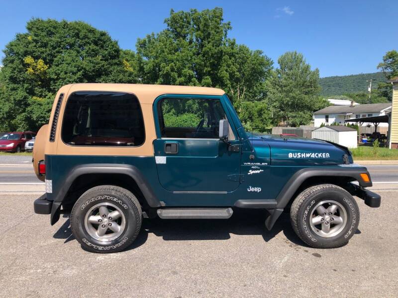 1997 Jeep Wrangler for sale at George's Used Cars Inc in Orbisonia PA