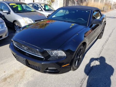 2013 Ford Mustang for sale at Howe's Auto Sales in Lowell MA