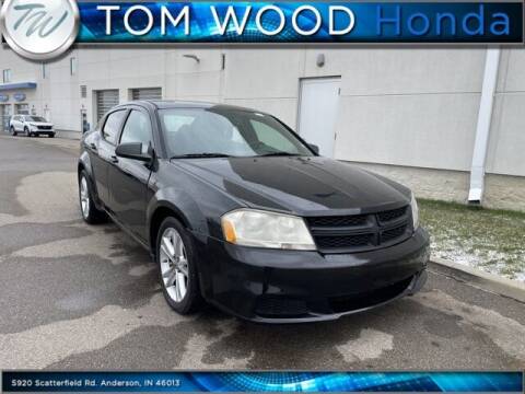 2013 Dodge Avenger for sale at Tom Wood Honda in Anderson IN