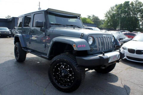 2015 Jeep Wrangler Unlimited for sale at CU Carfinders in Norcross GA