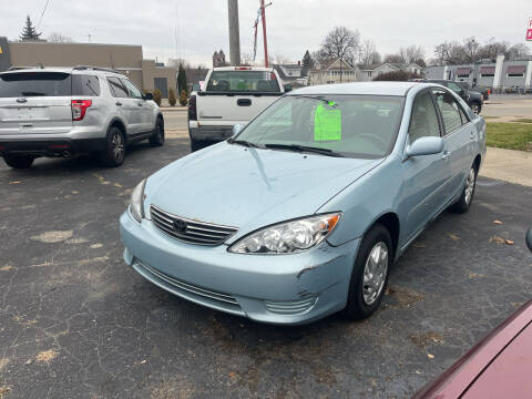 2006 Toyota Camry for sale at Holiday Auto Sales in Grand Rapids MI