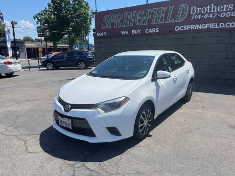 2015 Toyota Corolla for sale at SPRINGFIELD BROTHERS LLC in Fullerton CA