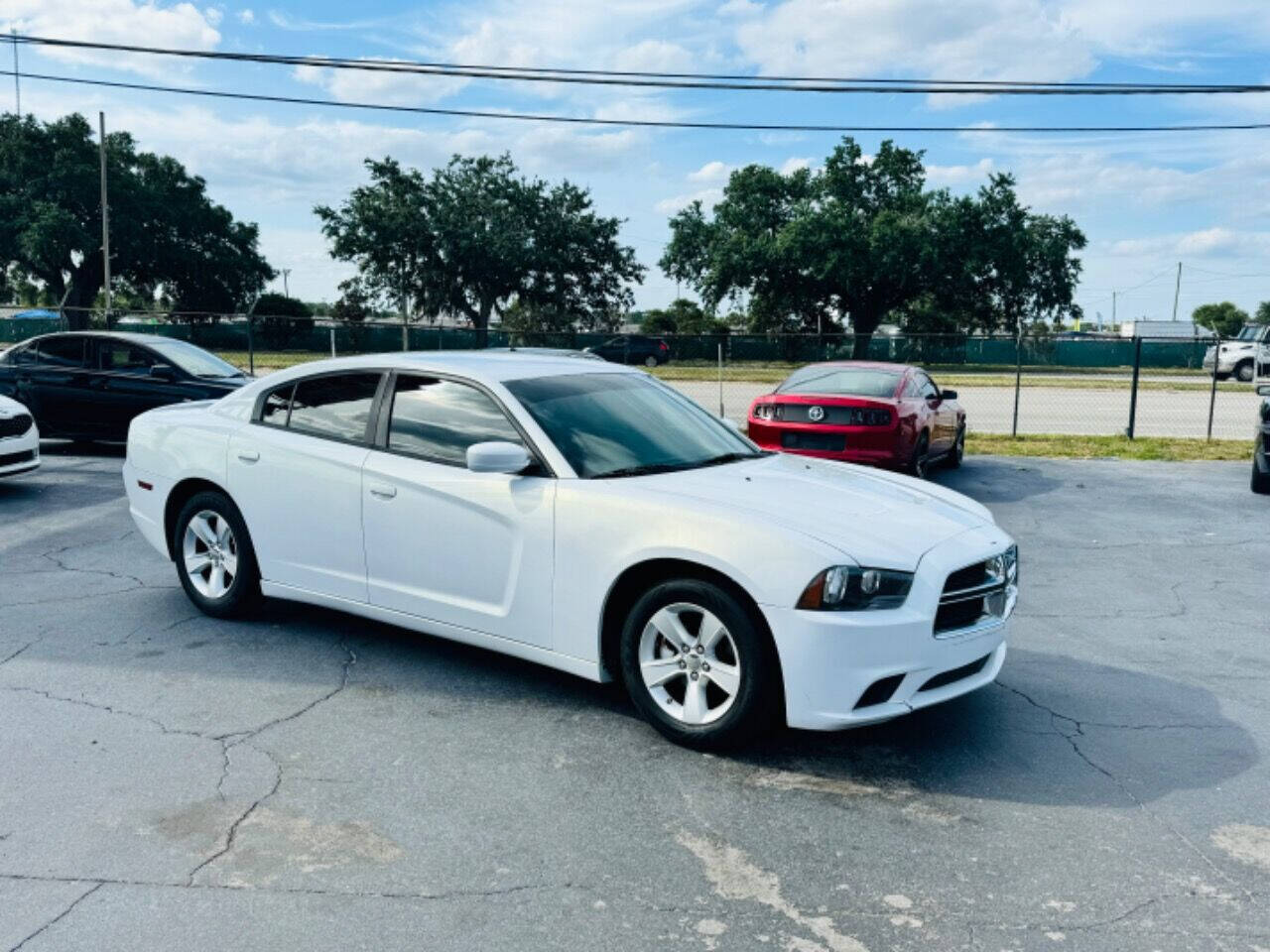 2014 Dodge Charger for sale at NOVA AUTO SALES in Orlando, FL