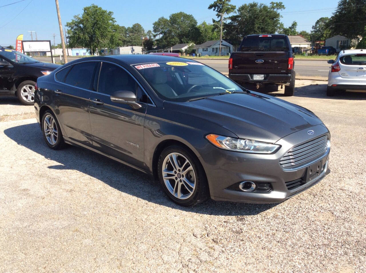 2015 Ford Fusion Hybrid for sale at SPRINGTIME MOTORS in Huntsville, TX