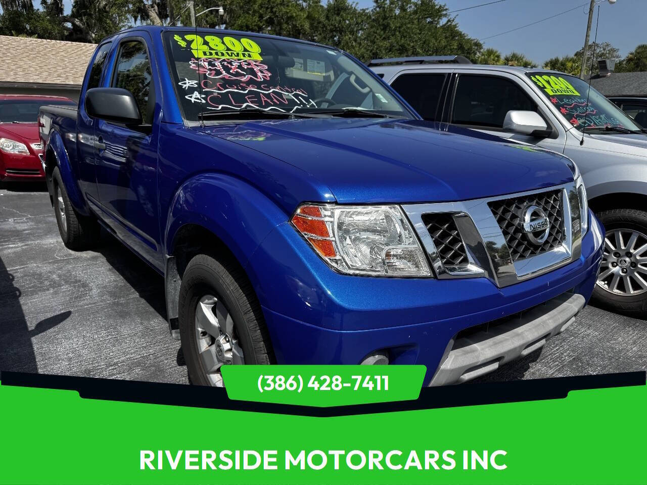 Metallic Blue 2012 Nissan Frontier Pickup Truck Four-Wheel Drive 5-Speed Automatic