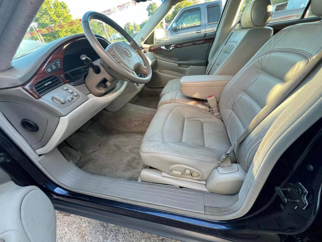 2003 Cadillac DeVille for sale at RT Barrett Auto Group in Austintown, OH