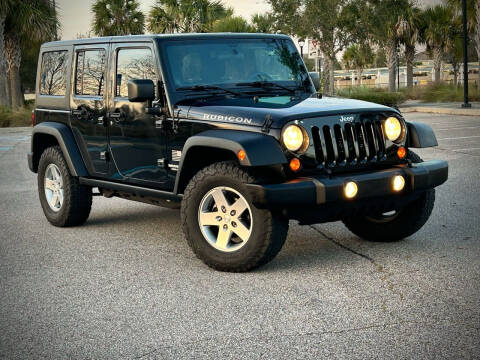 2012 Jeep Wrangler Unlimited for sale at Mycarsonline LLC in Sanford FL
